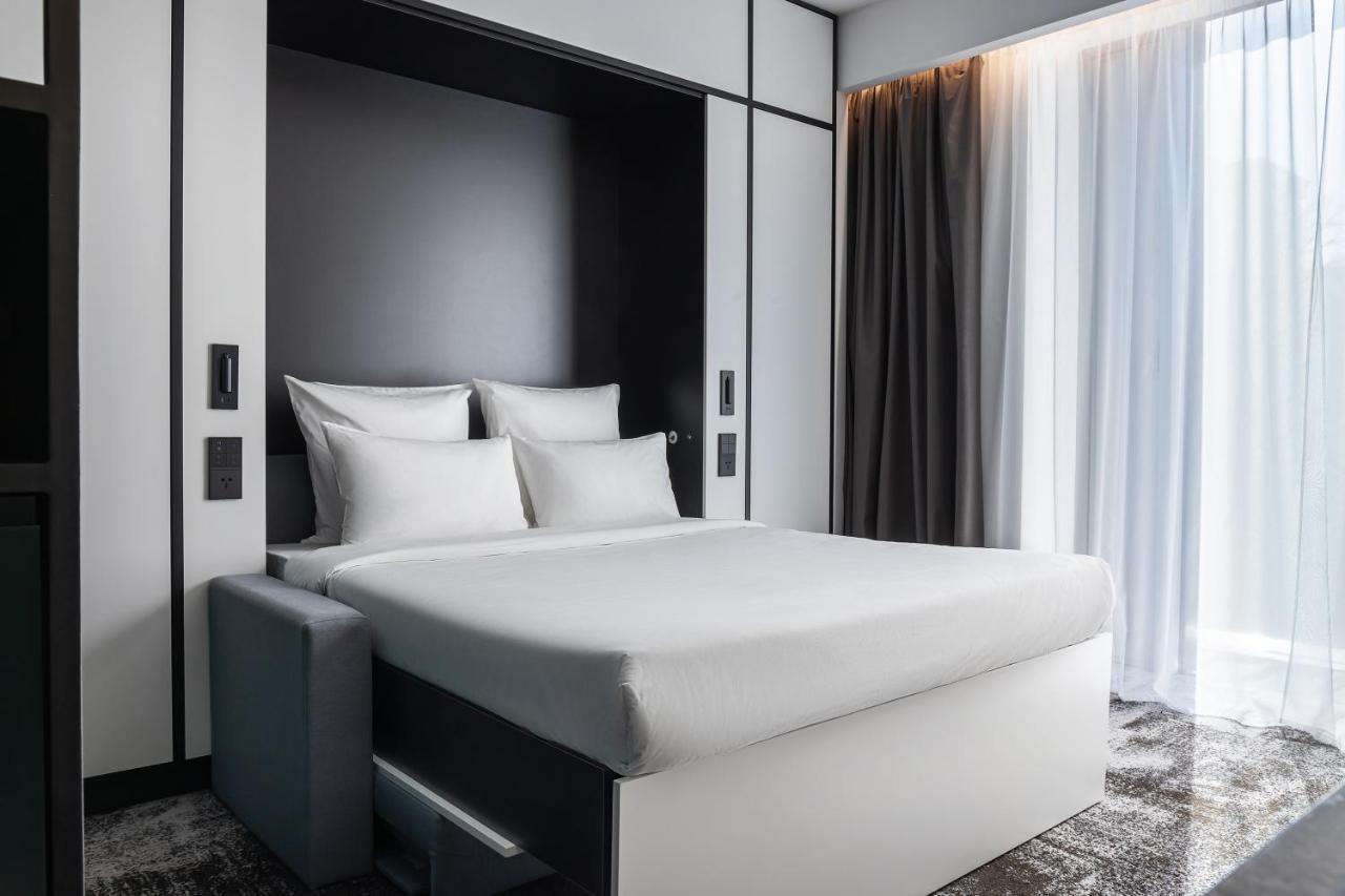 Novotel Living Almaty Jetisu Esterno foto