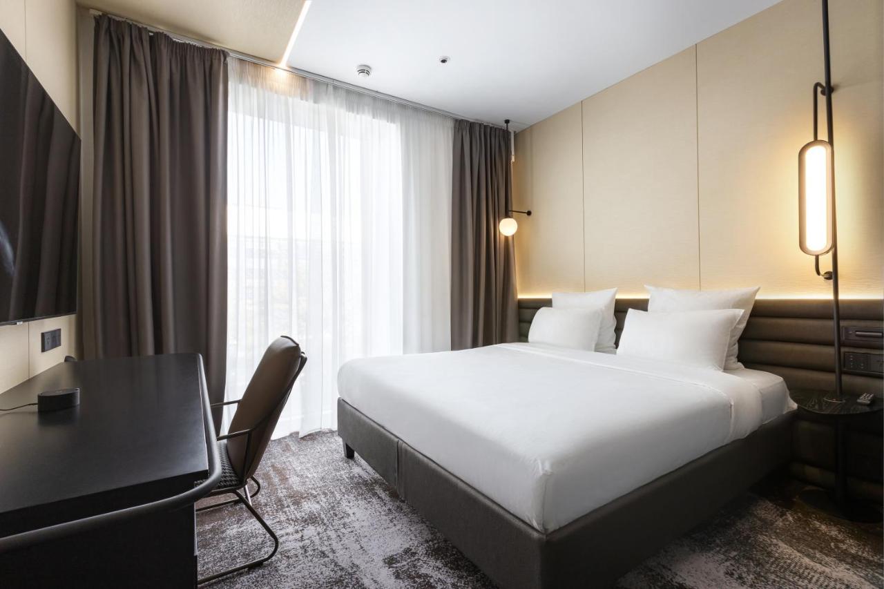 Novotel Living Almaty Jetisu Esterno foto