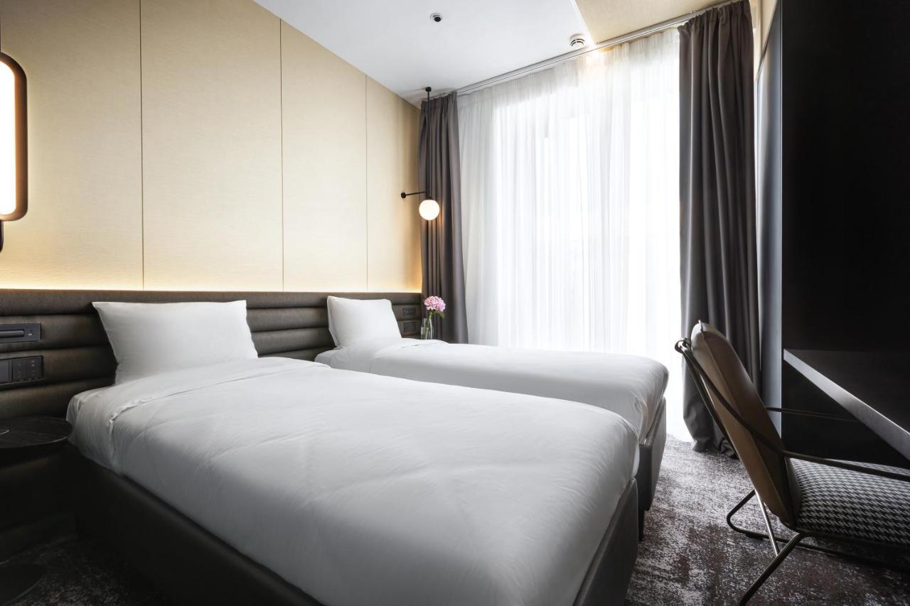 Novotel Living Almaty Jetisu Esterno foto